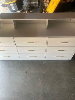Dresser with plugs