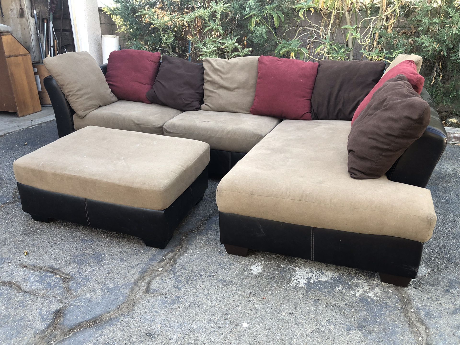 Ashley’s brown sectional couch with ottoman