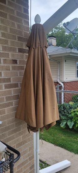 Umbrella and the stand in perfect condition