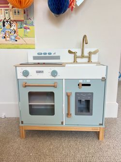 Wooden toy kitchen