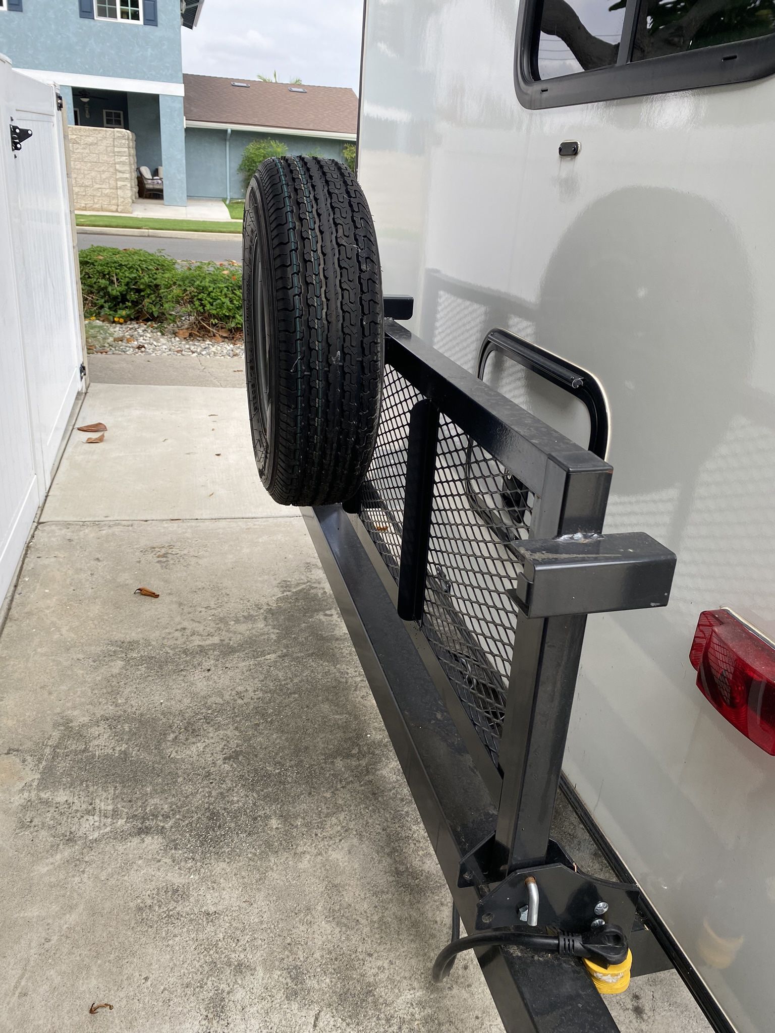 Travel trailer/RV Rear Frame Storage Rack- Fold Down with Spare Tire Holder 