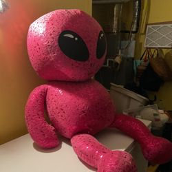 Giant pink alien plushie 