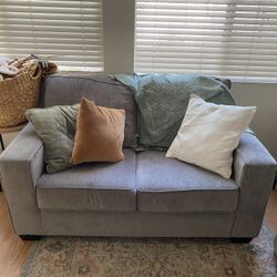 Gray loveseat 