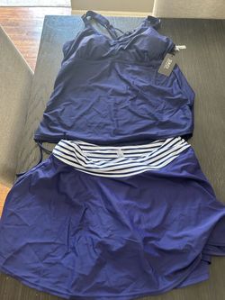 Size XL navy blue swim  top and skirt.