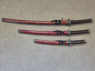 Three Matching Decorative Staffs