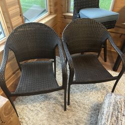 Two Dark Brown Wicker Chairs