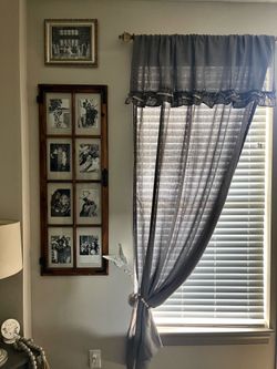 Two Gray Curtain Panels with Ruffle Valance