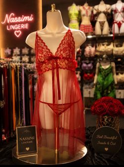 Discover timeless elegance with this stunning red lace babydoll lingerie set. Designed with delicate floral lace, sheer mesh fabric, and a flattering 