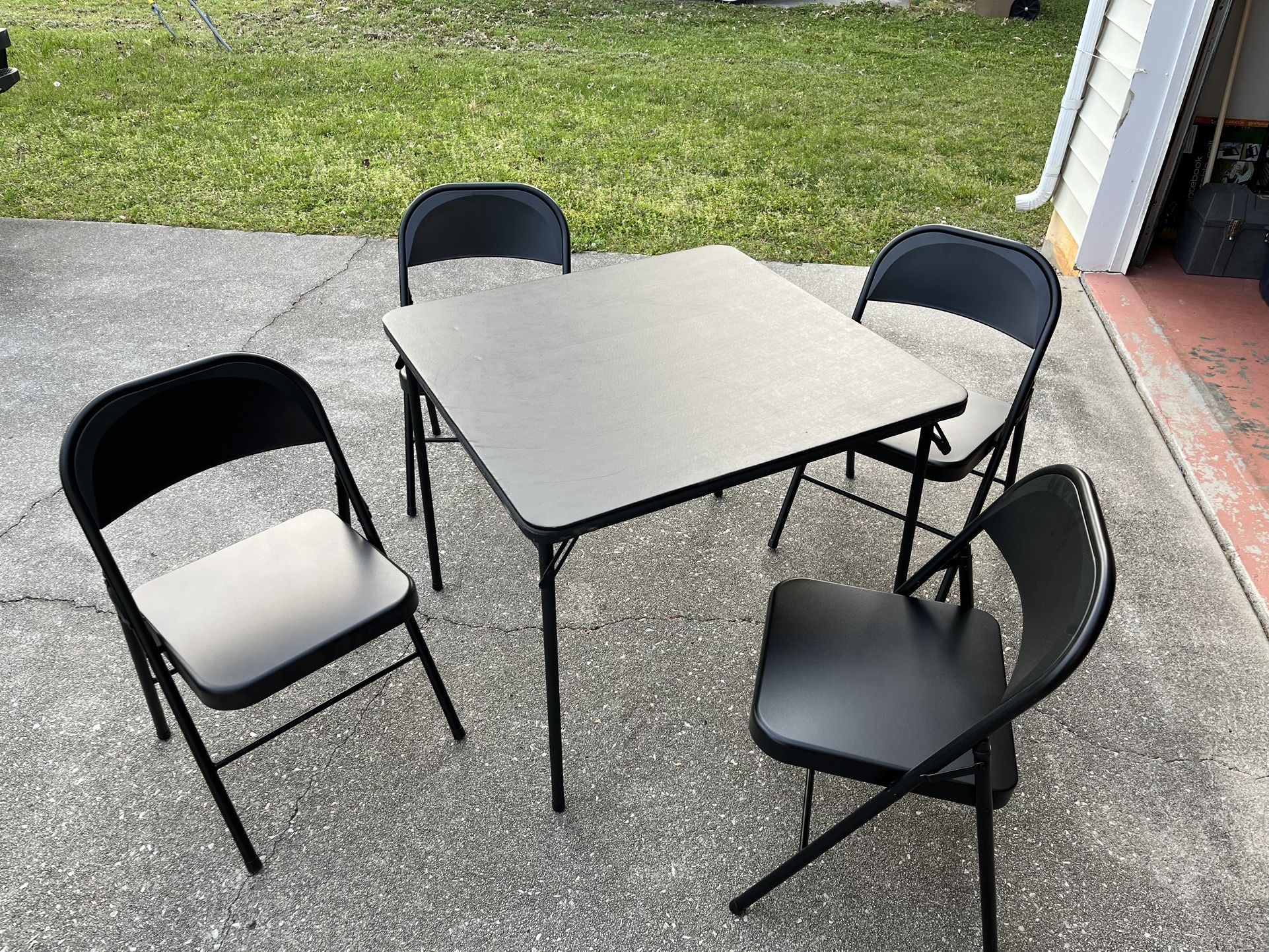 Cisco Signature Black Steel Folding Chairs & Table