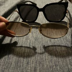 Two Pairs Of Sunglasses