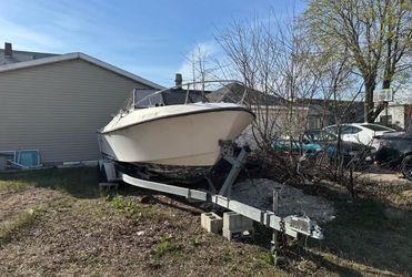 Selling Trailer, Motor,  +free Boat. $850 or best offer