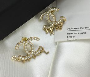 Authentic Chanel Chanel Rose Gold Pearl Earrings for Sale in