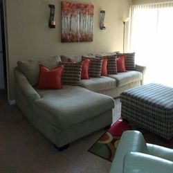 Sectional Sofa With Pillows Ottoman..