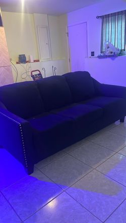 Navy blue 3 seat couch/pullout bed