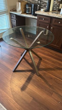 Round glass dining table