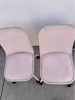 Target two pink office chairs