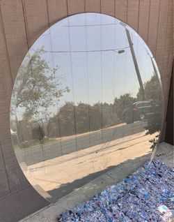 Round glass 42” table top w/beveled edge.