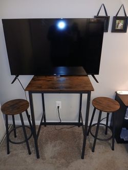 Roku..tv....table and two stools
