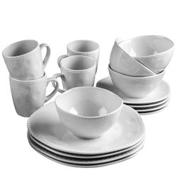 Nadia" dinnerware service features a beaded border for dimensional interest. 16-piece set includes four each: dinner plates (10.8"), salad plates (8")