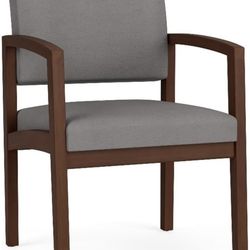 Comfortable armchair. It features a seat and backrest upholstered in gray