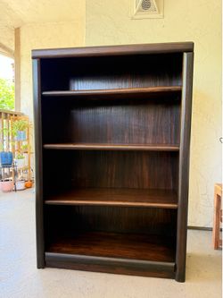 Sturdy dark brown wooden bookcase