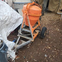 Smith mixer tow behind truck. Good, 3 or 4 bags. Wool, worst electric good tires.Good for stucco, and anything else