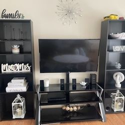 Tv, Black Shelfs And TV Stand