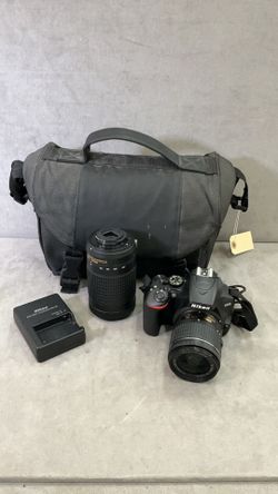 and case Nikon D 3500 camera kit 18 to 55 mm lens 70 to 300 mm lens with charger and case