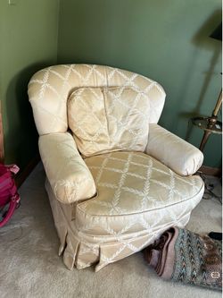 Cream colored English arm chair