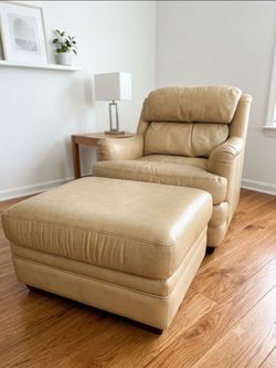 Whittemore-Sherrill Leather Swivel Armchair and Ottoman