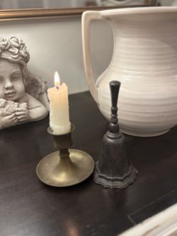 Vintage bell and vintage candle holder