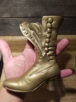 vintage brass women's boot statue