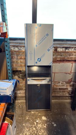 Novacel paper towel dispenser and trash bin