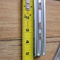 Bulk lot of 640 heavy-duty aluminum gutter hangers (hidden gutter brackets) 