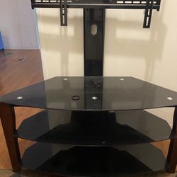 TV Stand With 3  Glass Shelves  44”wide 22”tall. Just In Excellent shape 