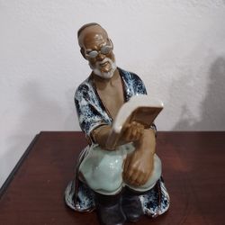 6" Vintage Chinese Mudman Glazed Pottery Figurine Elder With Glasses Reading Book (one leg of the glasses is missing; sold as is)