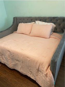 Full sized bed with trundle