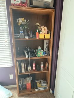 6 foot tall brown book shelf