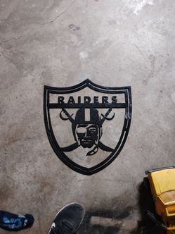 Metal raider sign