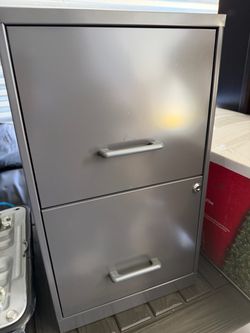 Filing cabinet with lock and keys