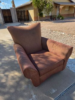 Maroon/brown living room chair
