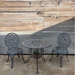 Vintage cast iron humming bird patio table