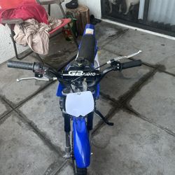 it’s a GBMOTO Dakar PFW 50cc 2 Stroke Gas Dirt Bike