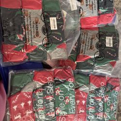 Christmas Socks each pack of socks contains 6 pairs of Christmas socks each pack is 10 bucks