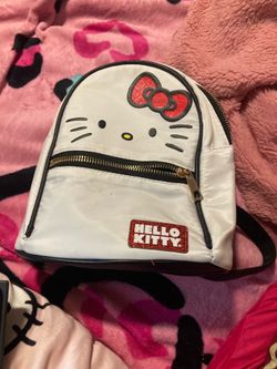 hello kitty mini backpack ( tag is inside of bag )