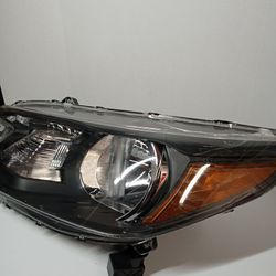 new, in box, left headlight fits 2012-2014 Honda  CR-V Drivers Side 


