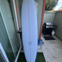 Mid Length 7’4” Surfboard 