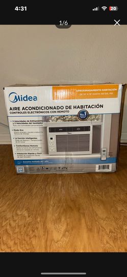 Midea 5,000 BTU Room Air Conditioner with electronic controls and remote
