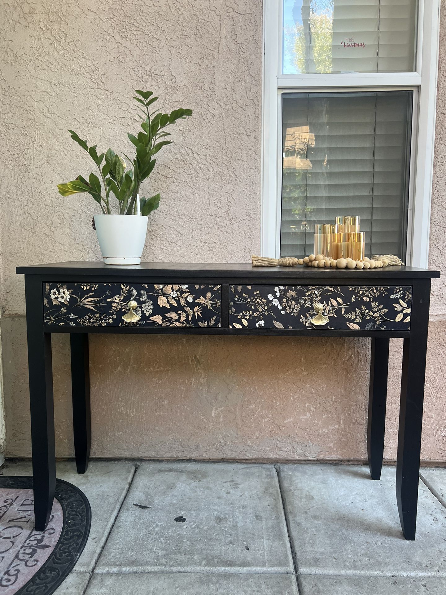 Refurbished black console table with Ginko leaf drawer knobs