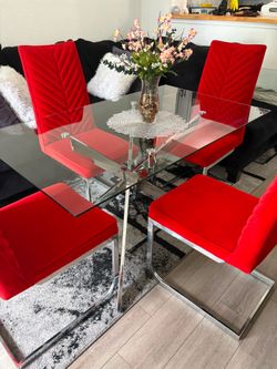 Glass Dining Table with Red Suede Chairs